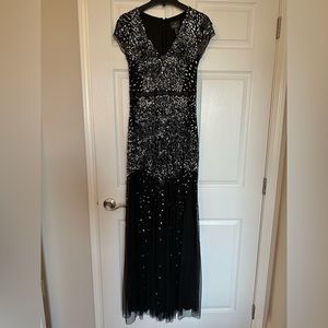 Black Adrianna Papell gown w/silver sequins and beading.